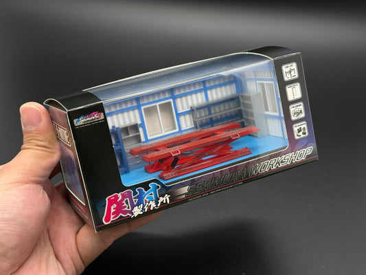Sekimura 1/64 garage display box with clear window, blue interior, red lifts