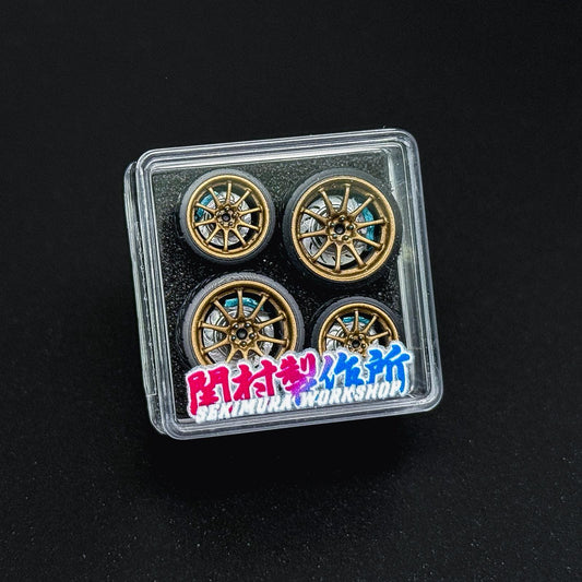 Bronze model car wheels set of four in clear blister pack with gold spokes