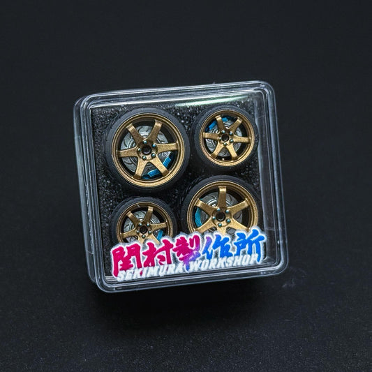 ChoroQ TE37 wheels in clear blister, bronze with blue accents, four-spoke rims