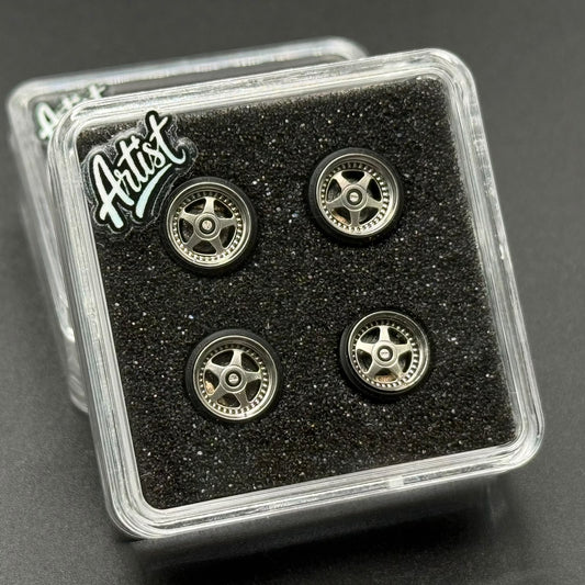 1/64 scale wheels in clear case, four silver spoked wheels on black foam