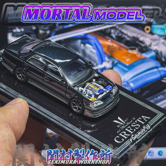 Black 1/64 Toyota JZX100 Cresta model car close-up with detailed engine bay