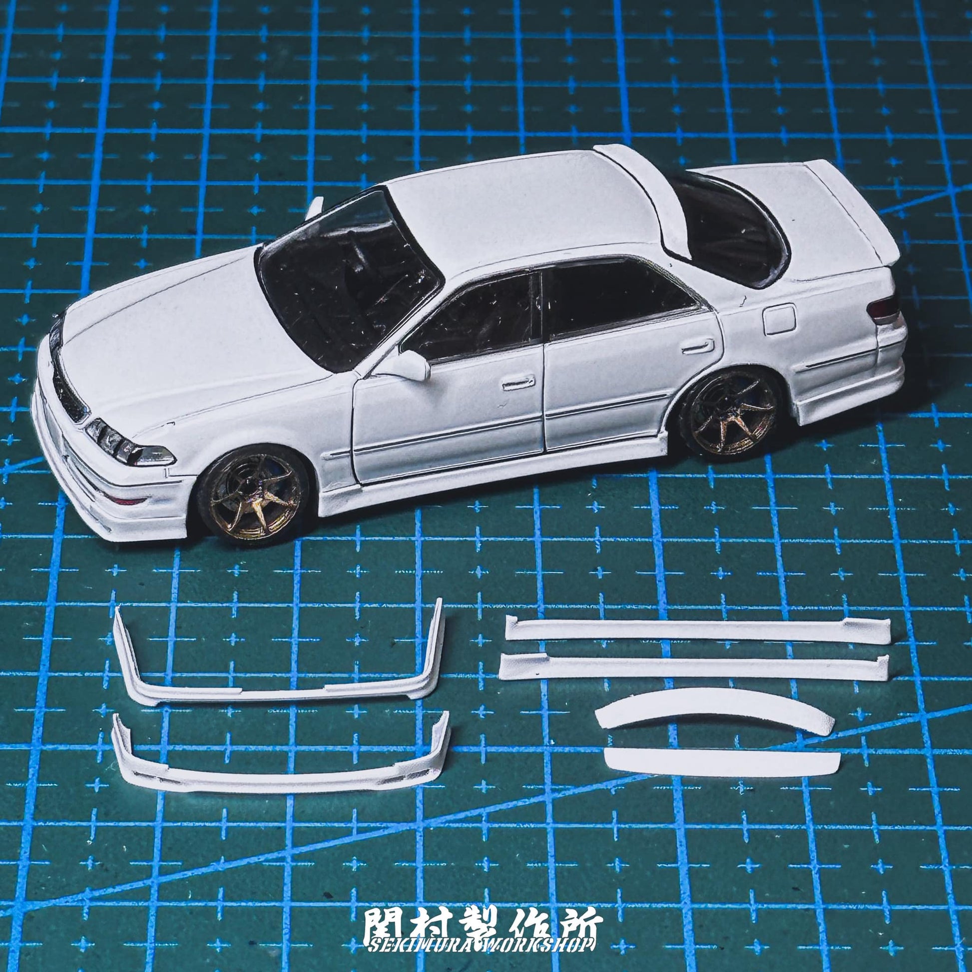 White JZX100 Mark2 body kit parts set: bumpers, side skirts, and lip pieces