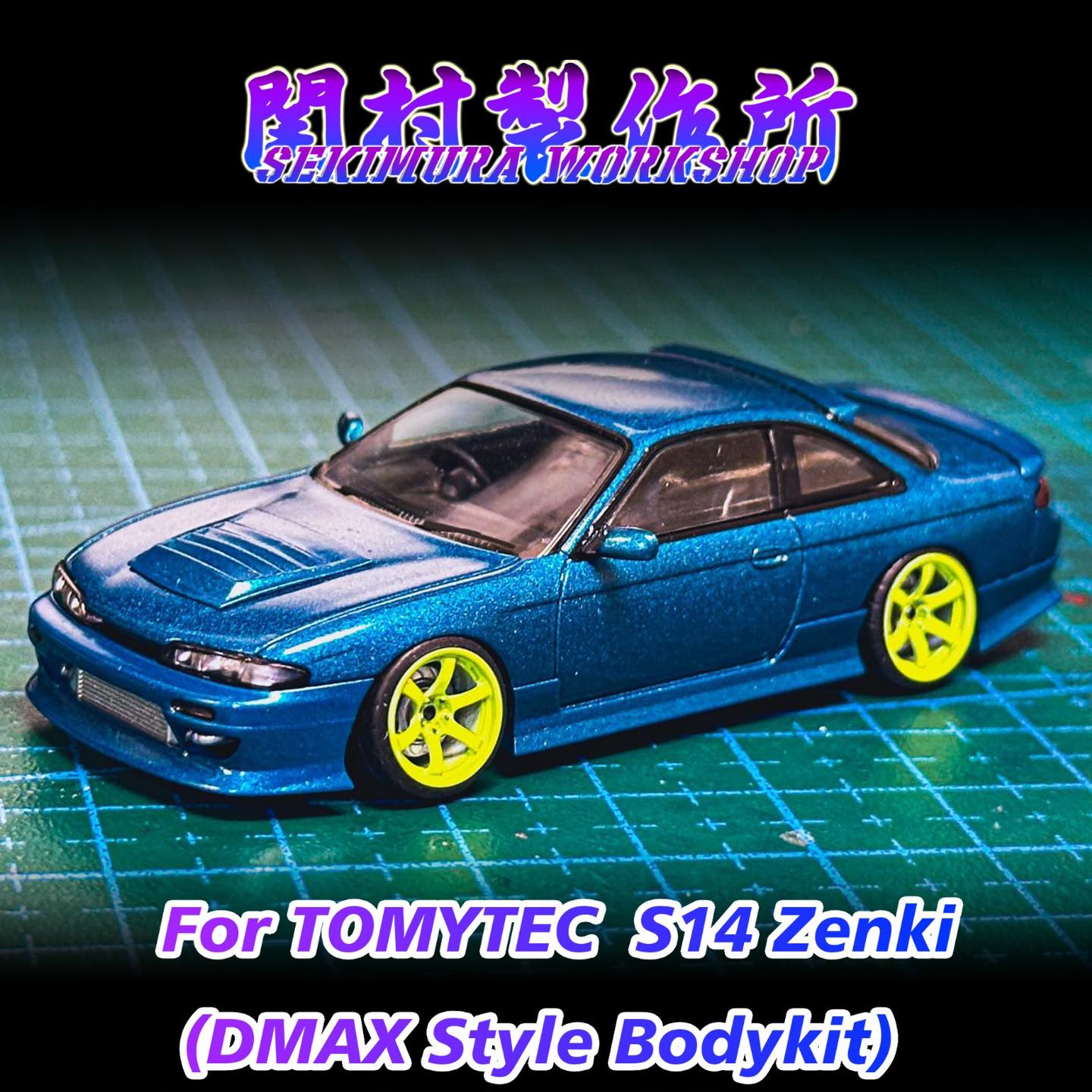 Blue sports car body kit model with yellow wheels and side skirt details