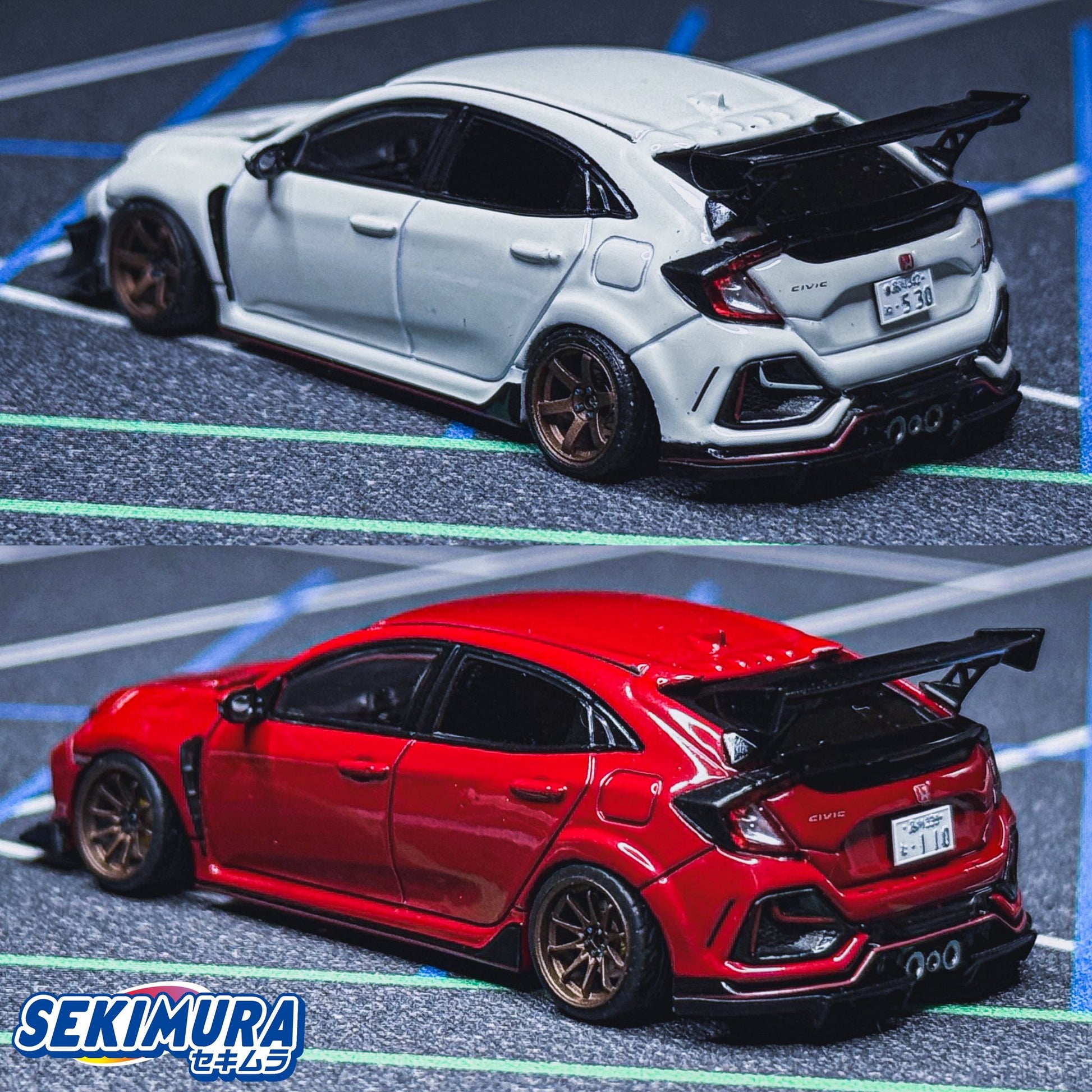 Rear three-quarter view of white and red sports car models with black lip kit