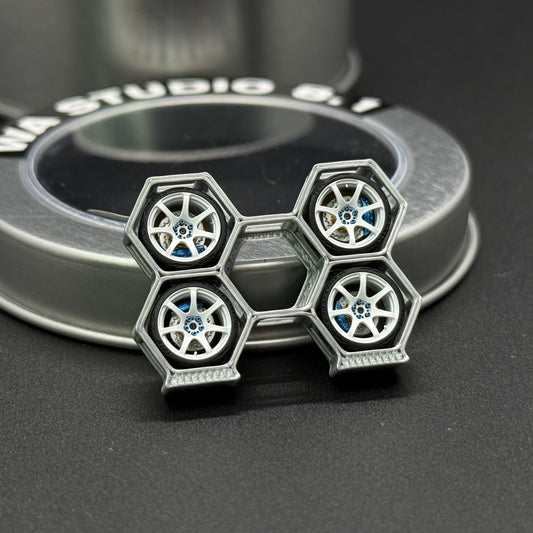 Metal 3D hex-shaped wheel set with five-spoke rims, mounted in a hex pattern