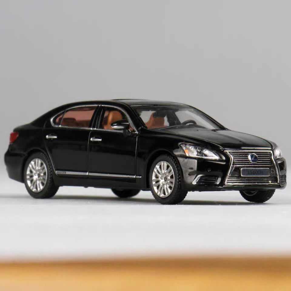 1/64 scale Lexus LS600hL die-cast sedan, black, front-side 3/4 view
