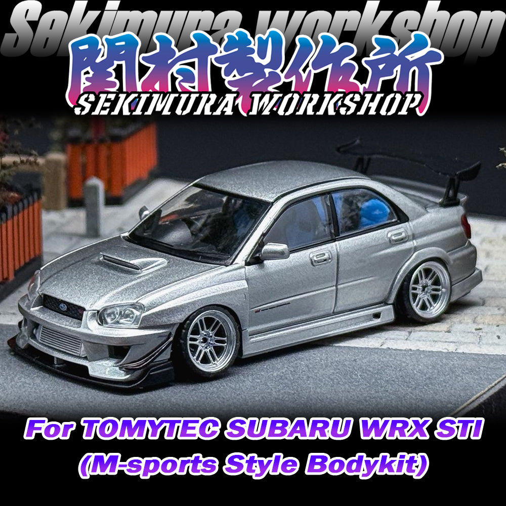 Silver SUBARU WRX STI model car with M-sports bodykit, front three-quarter view