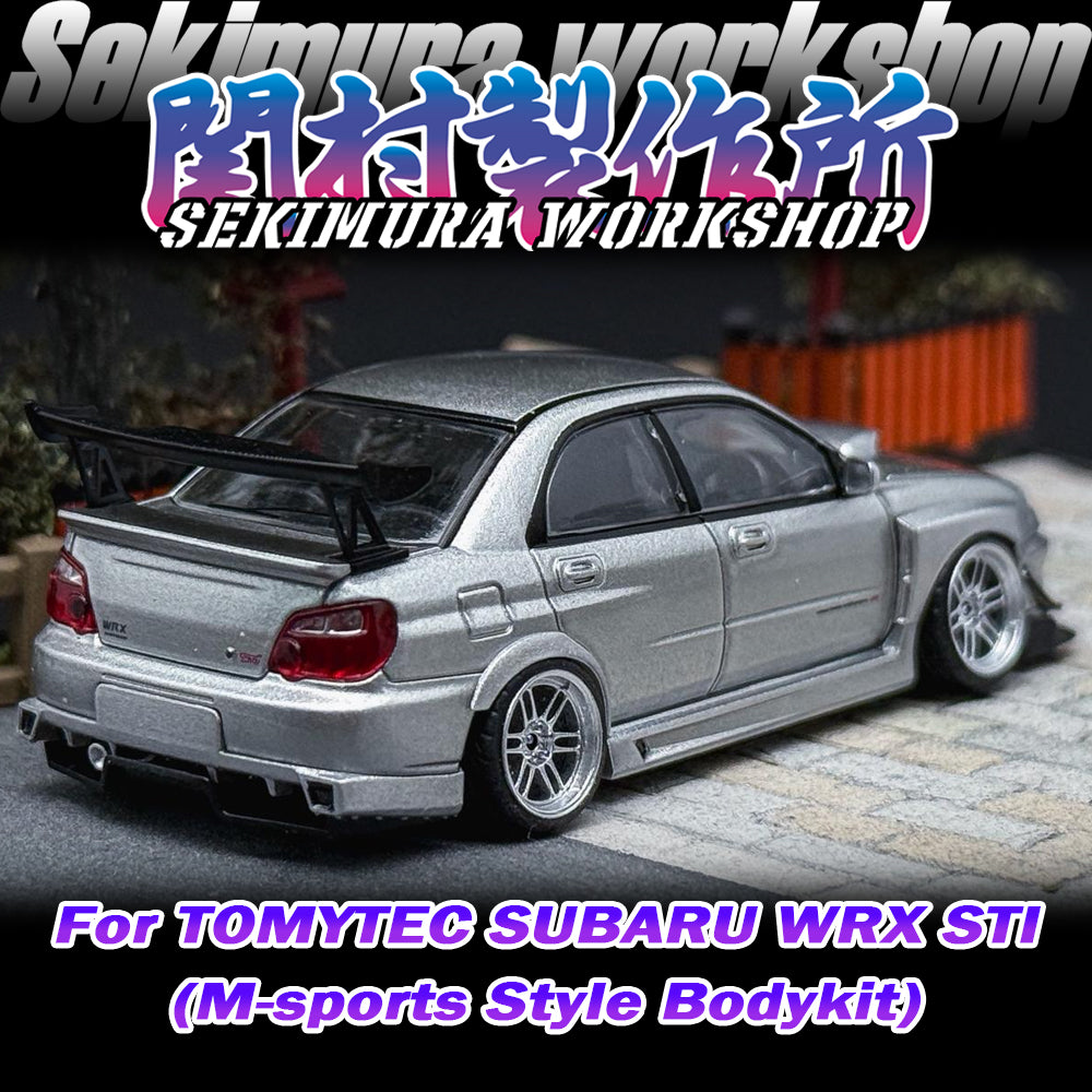 Silver SUBARU WRX STI model car with M-sports bodykit, rear three-quarter view