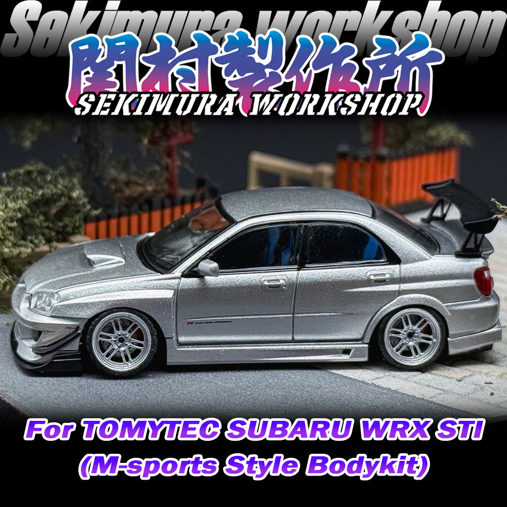 Silver SUBARU WRX STI model car with M-sports bodykit, side view with rear spoiler