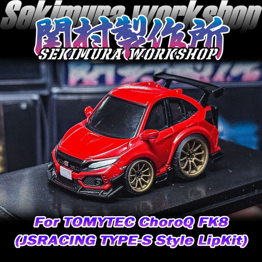 Red model car with black front lip and side aero, gold wheels.