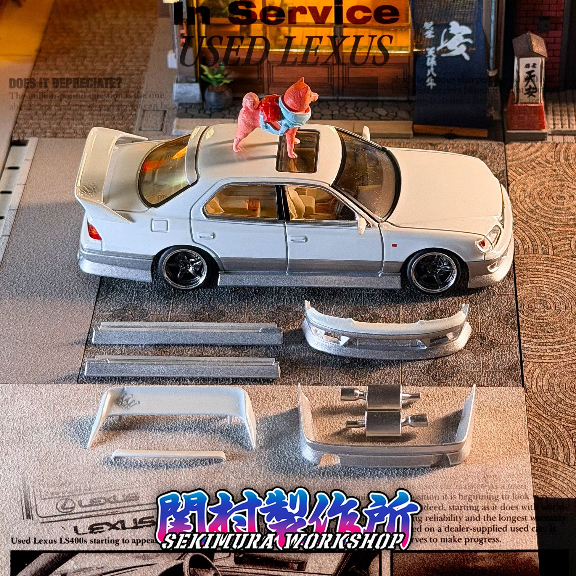 Model car body kit parts in white and silver, including bumper and side pieces
