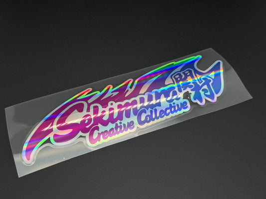 SekimuraCCC sticker with multicolor rainbow outline and Creative Collection text