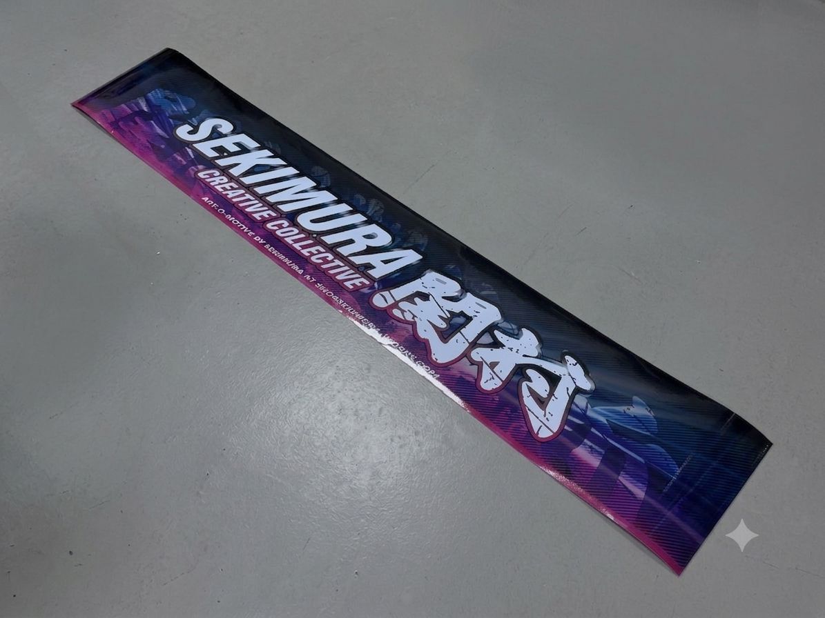 Decorative windshield banner, purple-blue gradient with Sekimura logo and text