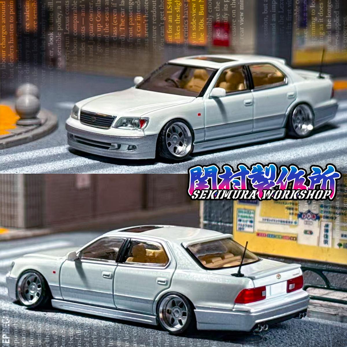 Light blue die-cast sedan model with aftermarket body kit, front and rear views