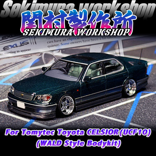 Two-tone dark green sedan die-cast car with Wald-style body kit and chrome wheels