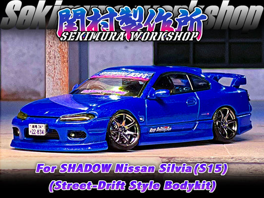 Blue sports car bodykit model with front lip and side skirts