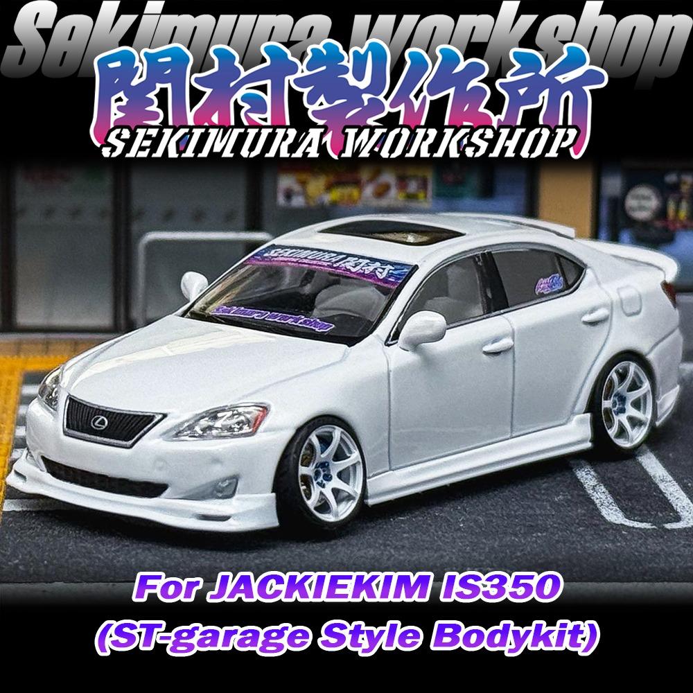 White Lexus IS350-style bodykit car with front bumper lip and performance wheels, front 3/4