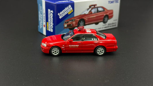 Tomytec 1/64 ER34 4-Door red model car, side view with display box