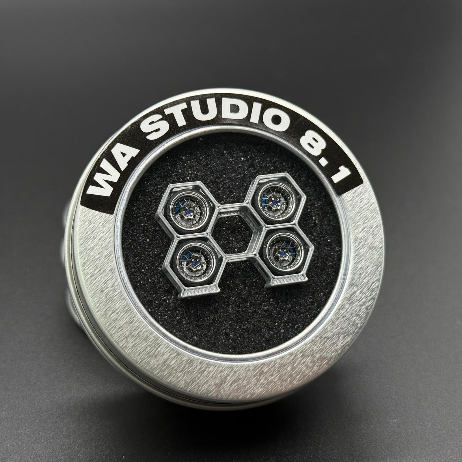 Round WA STUDIO 1/64 wheel center cap with five hex bolt details