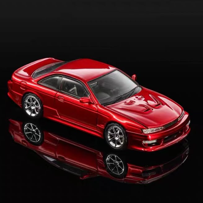 Red 1/64 scale Silvia S14 diecast coupe model, front three-quarter view