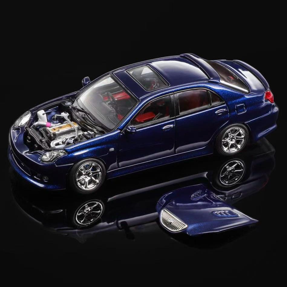 Blue 1/64 scale model sedan with open hood, exposed engine detail.