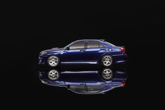 Blue 1/64 scale model sedan with silver wheels, shown from side view.