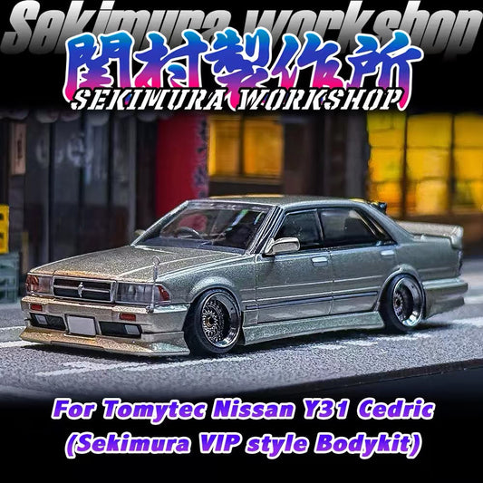 Silver Nissan Y31 Cedric model with Sekimura VIP bodykit, deep-dish wheels and lowered stance